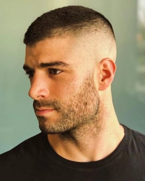 Man with a high and tight military haircut