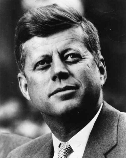 JFK with a smart, mid-length Ivy League haircut