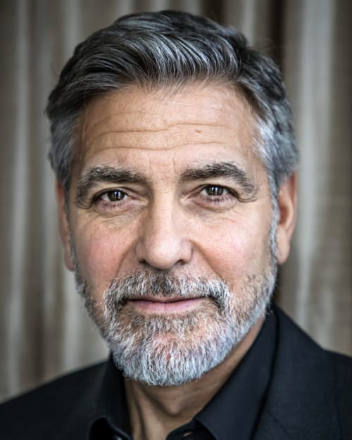 George Clooney with an Ivy League side parting haircut