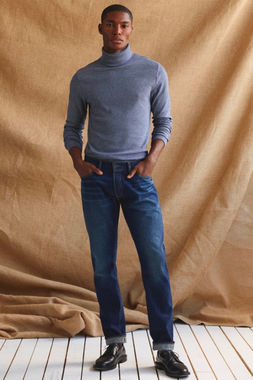 Men's jeans, blue turtleneck and loafers outfit