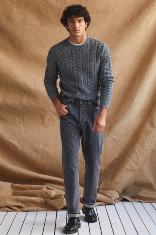 Men's grey jeans, grey cable knit sweater and black leather chukka/desert boots outfit
