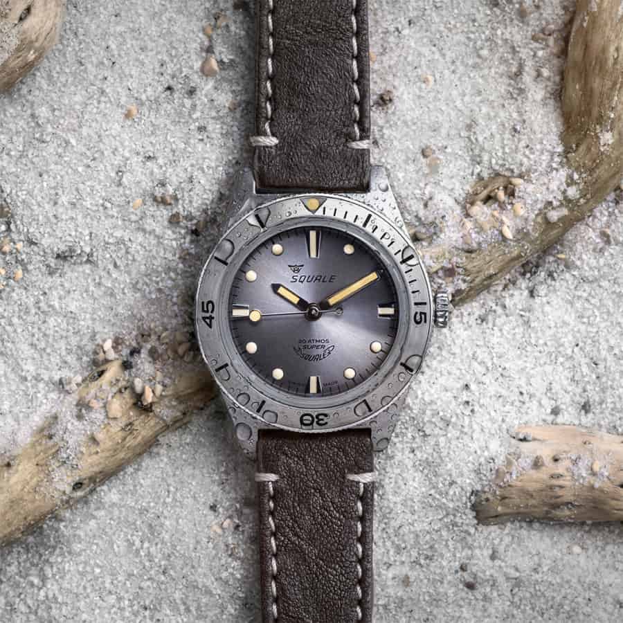 Squale watch laid on sand