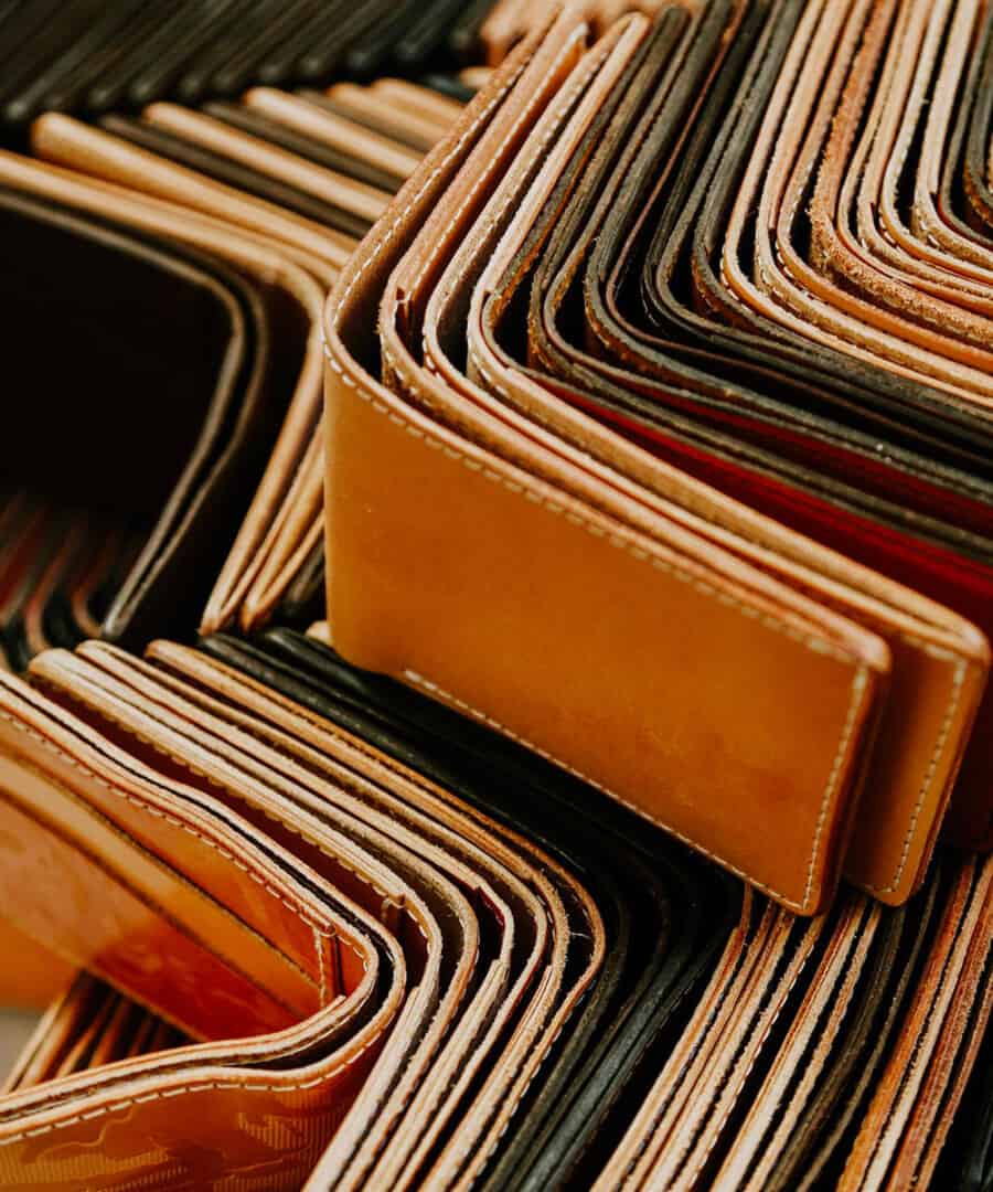 A stack of premium quality Made in the USA wallets by Tanner Goods