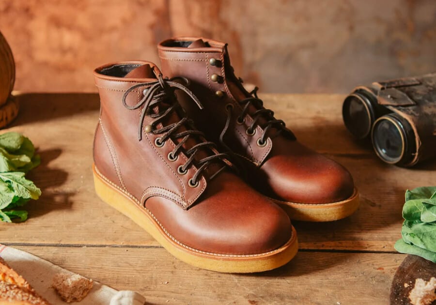 A pair of sturdy work boots with a thick sole will make you look taller