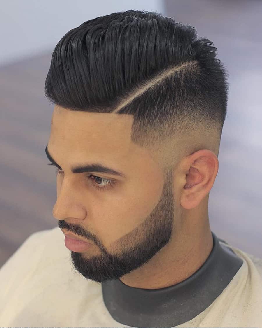Asian man with high pompadour, hard parting and high skin fade haircut