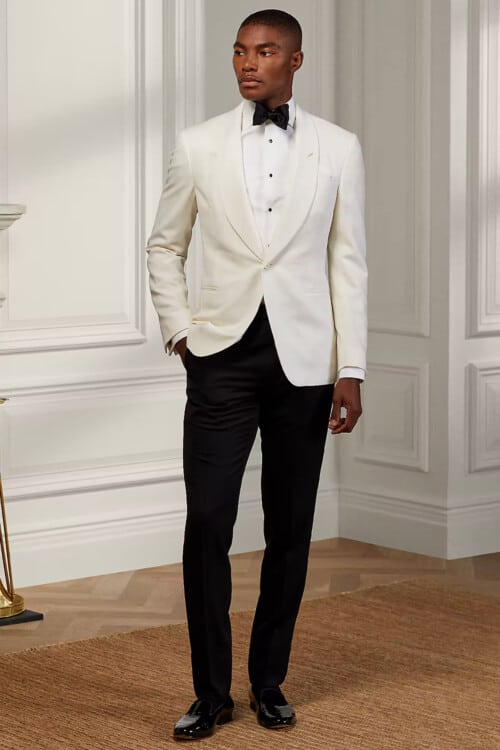 Men's modern black tie attire with a white dinner jacket