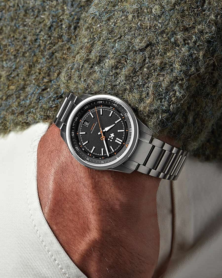 Man wearing a Christopher Ward British watch on wrist