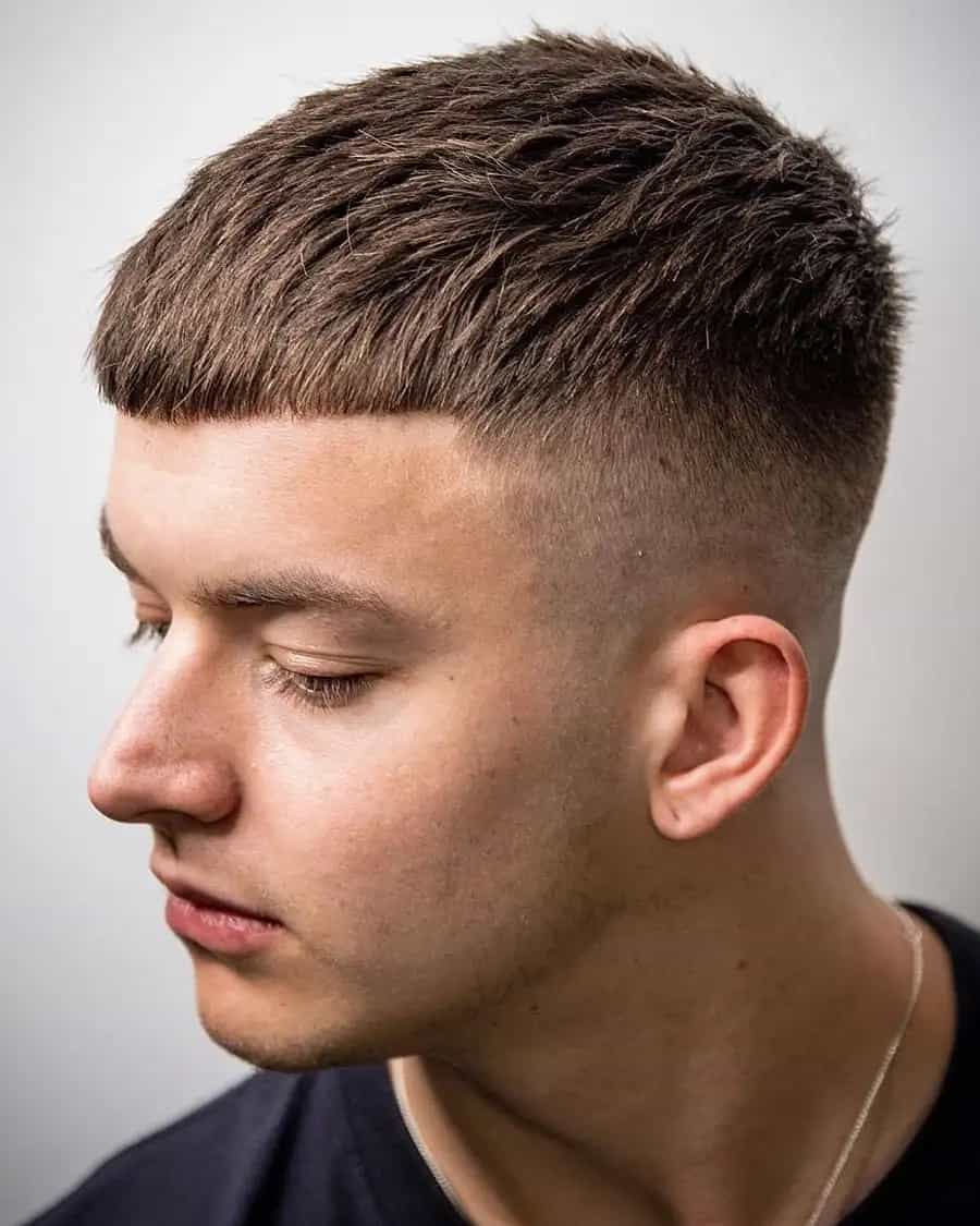Man with French crop and high taper fade haircut