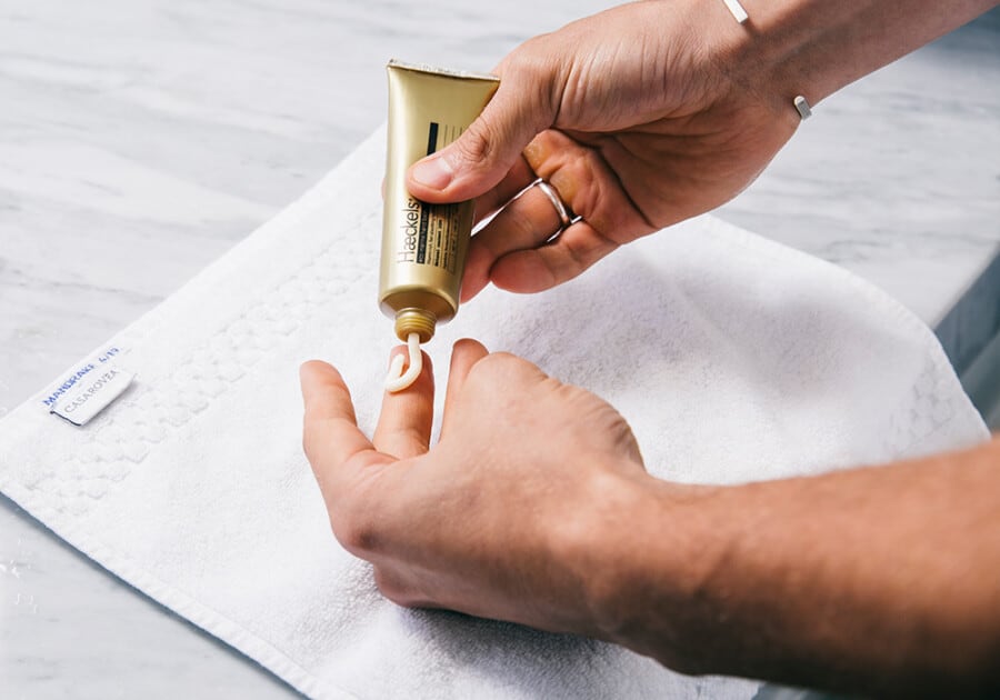 Man applying an anti-ageing grooming product