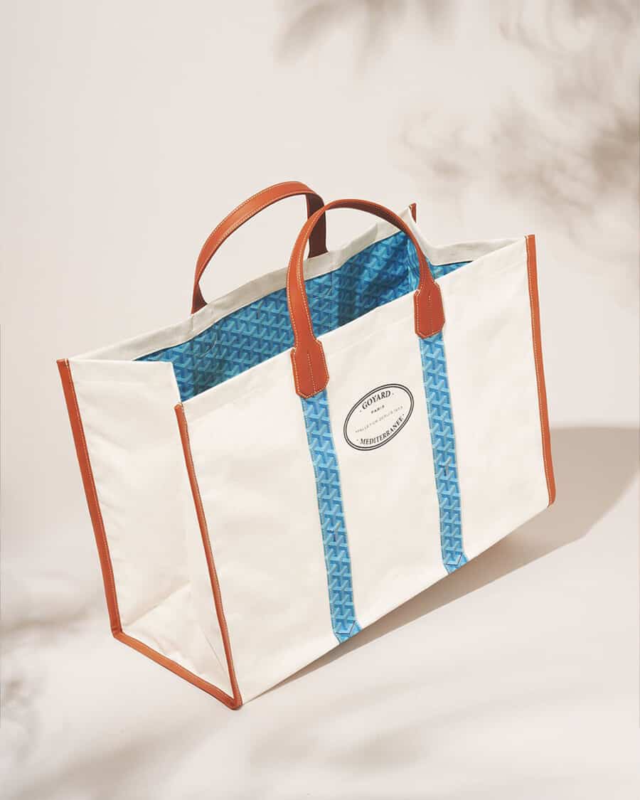 Luxury white branded Goyard tote bag with leather handles