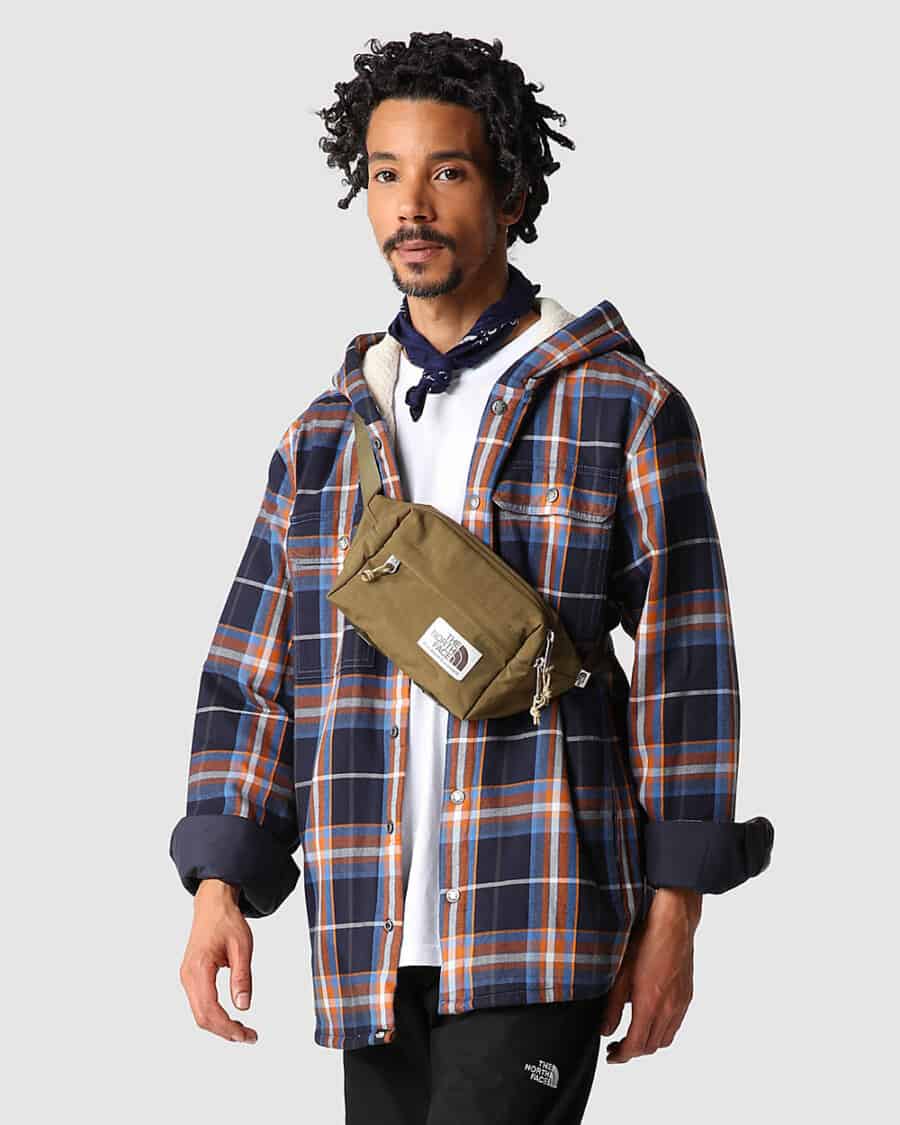 Men's North Face hooded overshirt with white T-shirt, crossbody bag and black pants