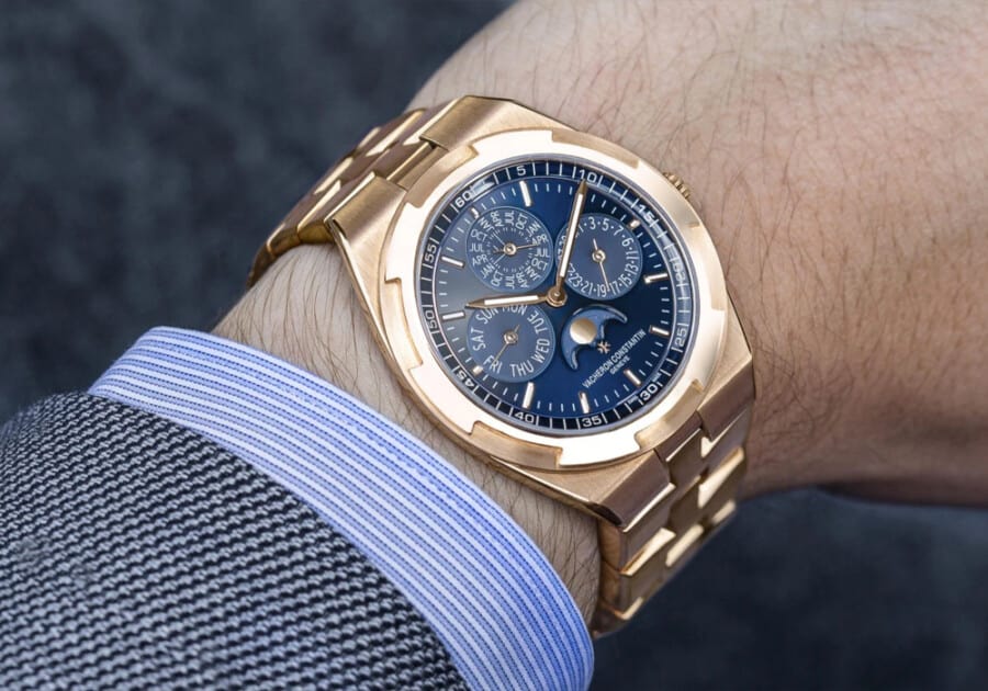 A Vacheron Constantin gold chronograph mechanical watch worn on wrist