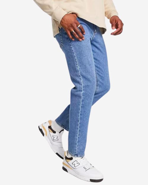ASOS DESIGN Stretch Tapered Jeans in Mid Wash Blue