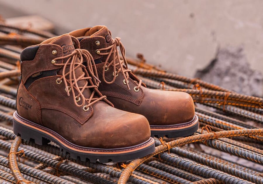 A pair of made in the USA Chippewa work boots in brown nubuck with a chunky rubber sole