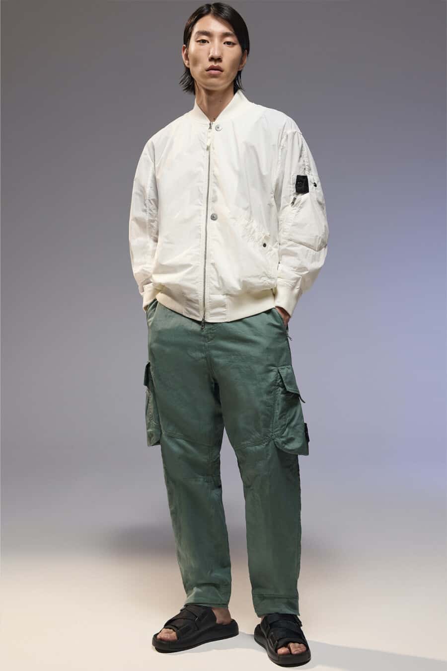 Men's technical nylon combat pants, nylon white bomber jacket and technical black slider sandals outfit