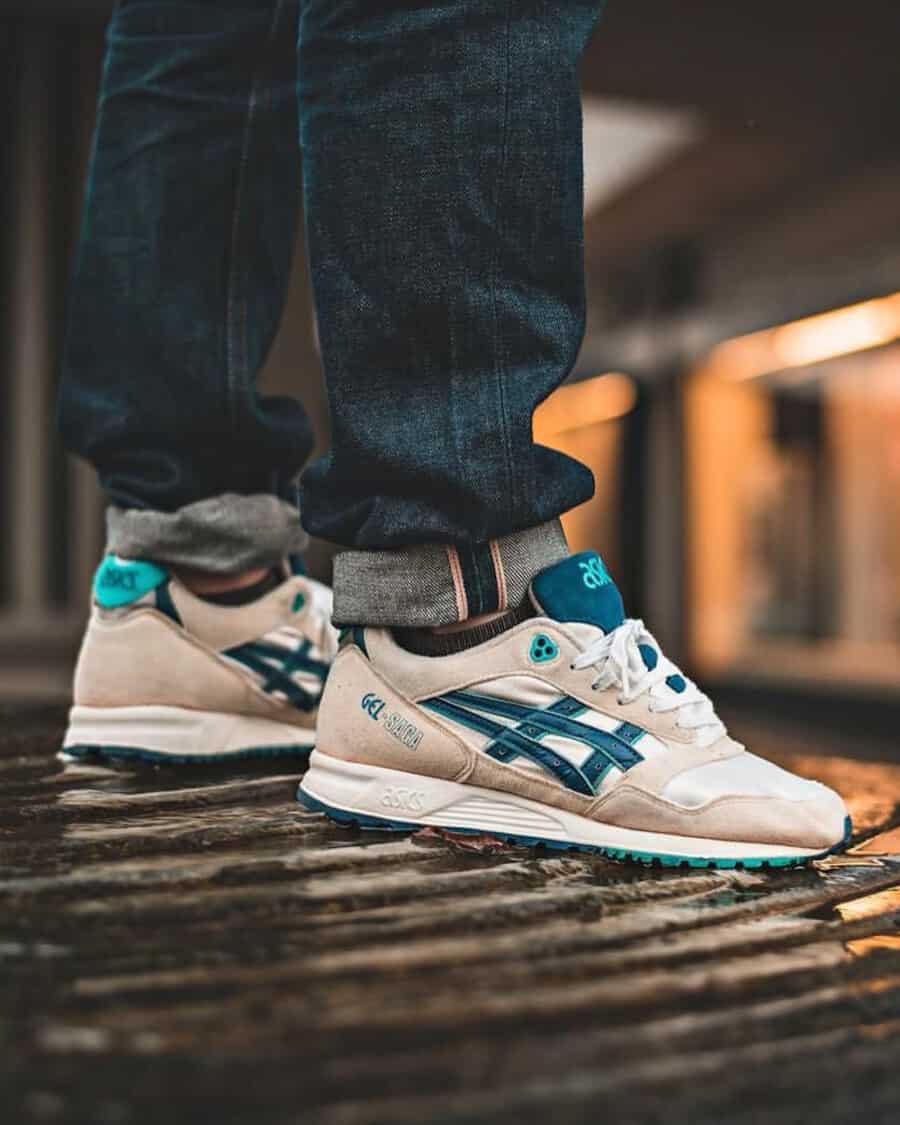 Asics Gel-Saga retro sneakers worn with raw selvedge denim jeans