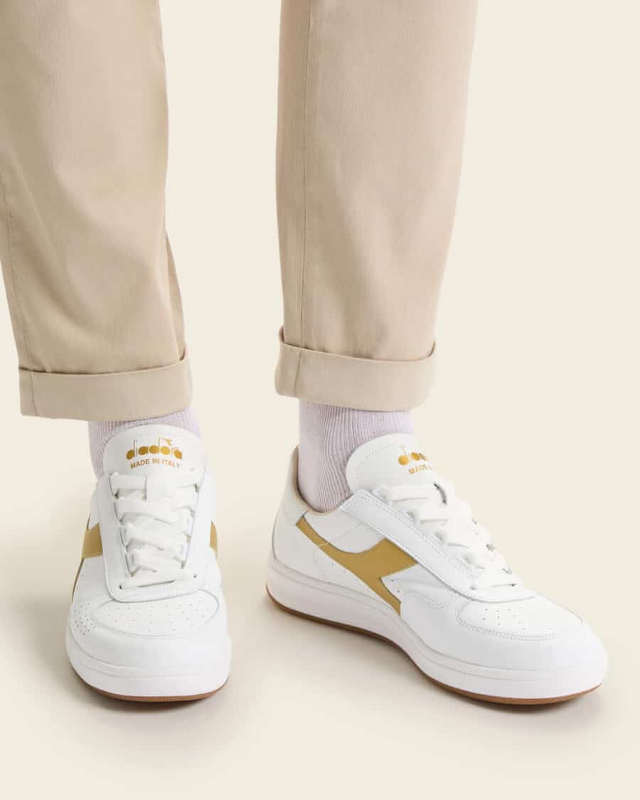 Retro Diadora B.ELITE H ITALIA SPORT sneakers worn with white socks and beige chino pants
