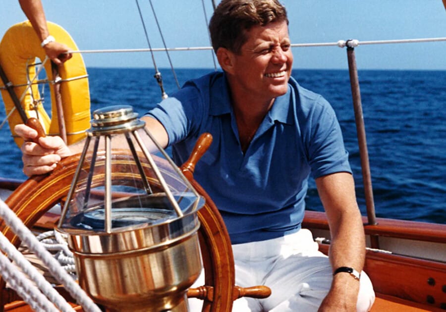 JFK sporting a square Omega Ultra Thin DeVille watch