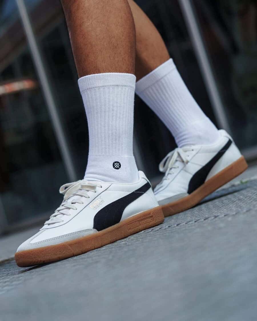 Puma Super Liga OG Retro Sneakers on feet worn with white socks