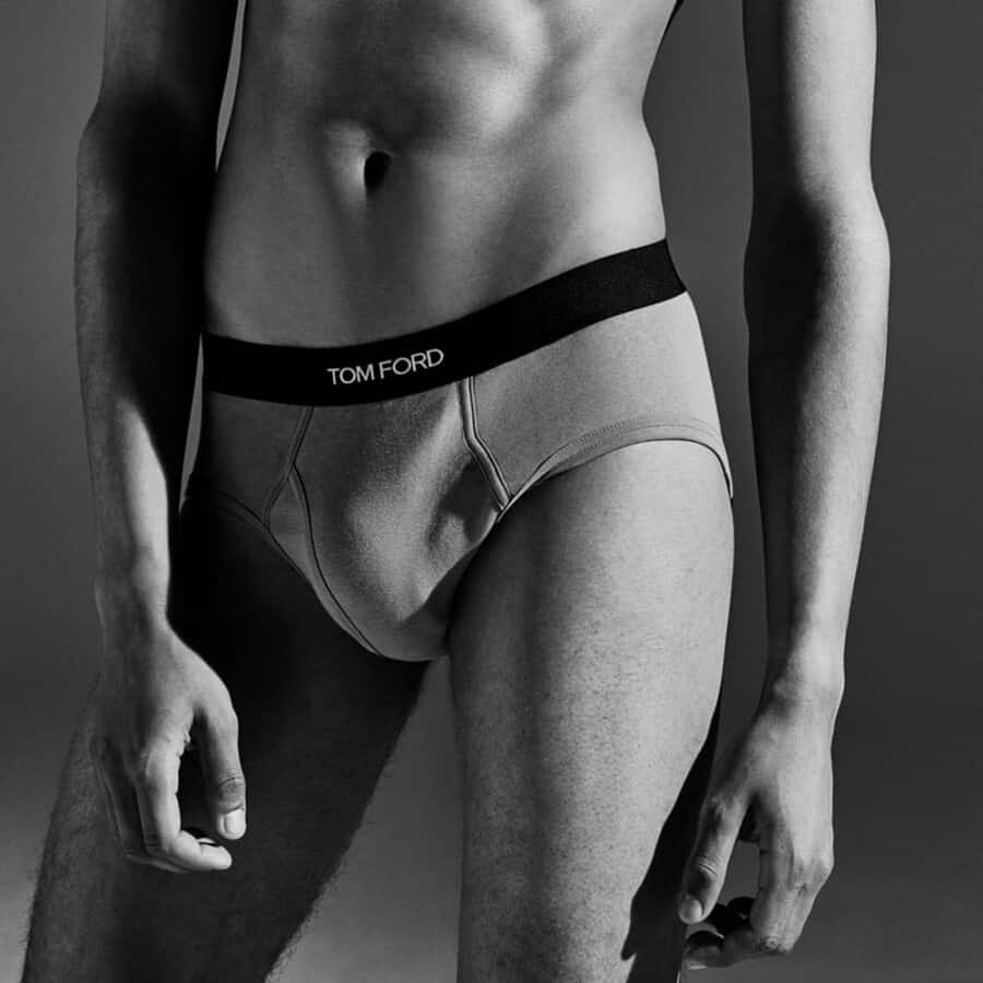 Man wearing tight fitting luxury Tom Ford briefs