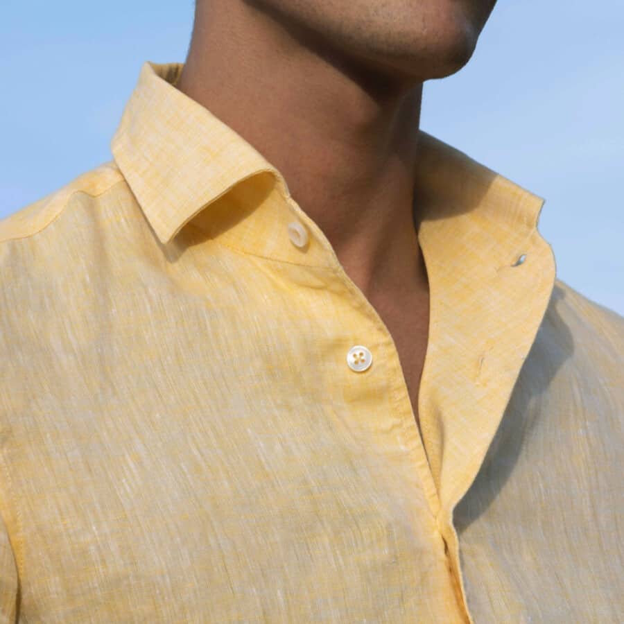 Close up of a yellow linen smart summer shirt