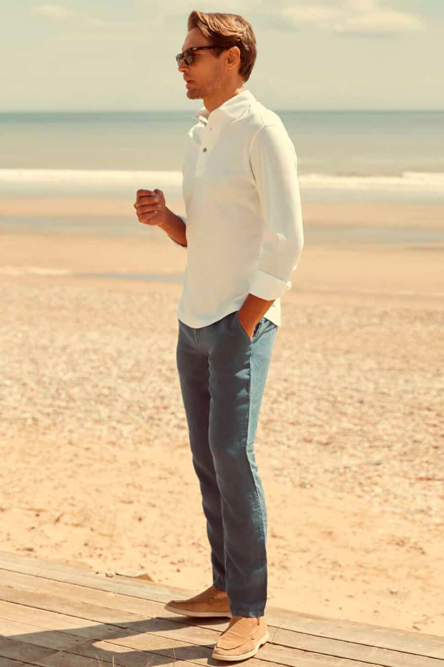 Men's blue linen trousers, long sleeve polo shirt and loafers outfit