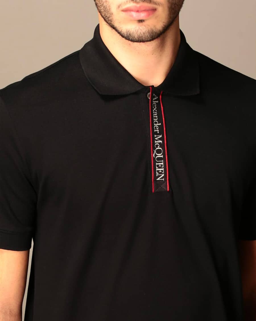 Close up of a men's Alexander McQueen luxury black branded polo shirt
