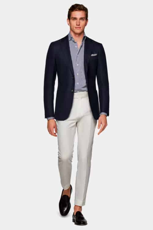 Men's white pants, blue/white striped shirt, navy blazer and brown leather tassel loafers outfit
