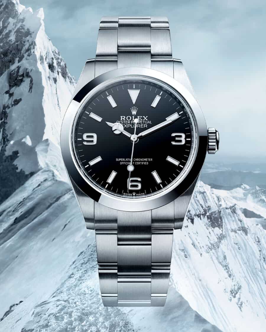 Rolex Explorer 40mm watch set against mountain