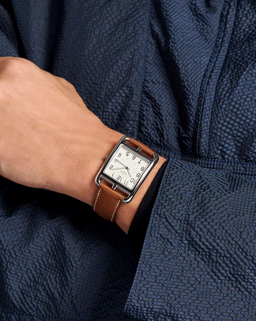 Hermes Cape Cod watch with tan leather strap on wrist