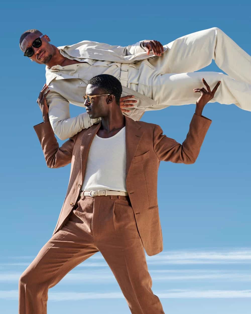 Suitsupply ad campaign with two black men wearing brown and stone tailoring