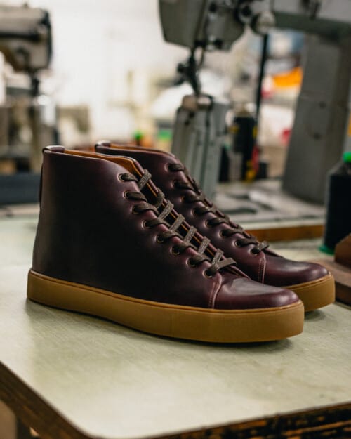 A pair of Crown Northampton Overstone Hi sneakers in rich burgundy leather and gum sole