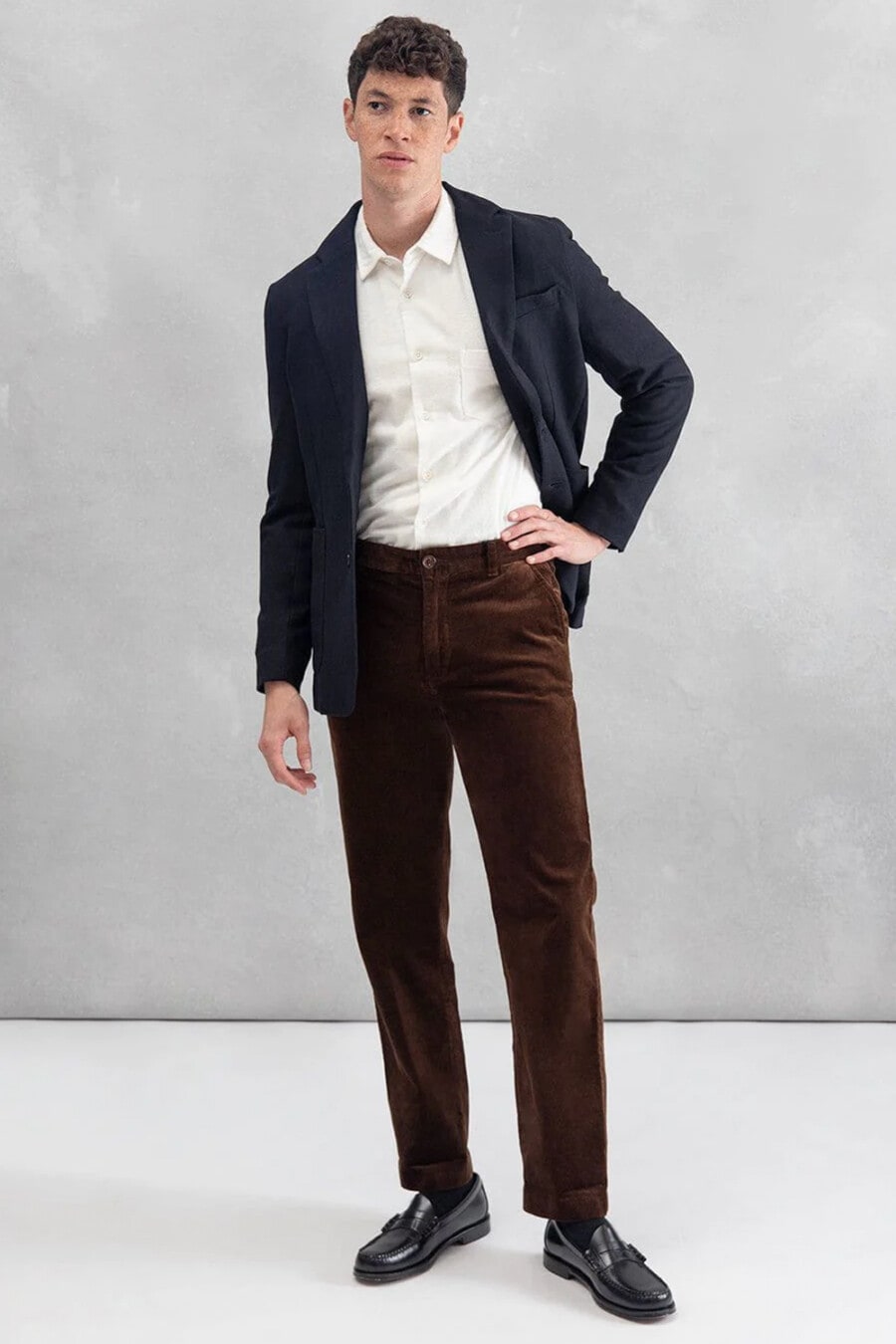 Men's Navy blazer, white shirt, brown corduroy pants and black leather penny loafers outfit