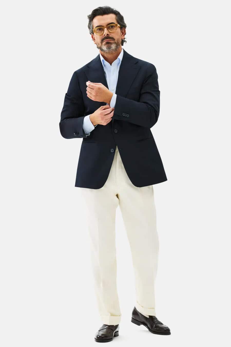 Men's navy blazer, sky blue shirt, off-white turn-up pants and brown leather penny loafers outfit