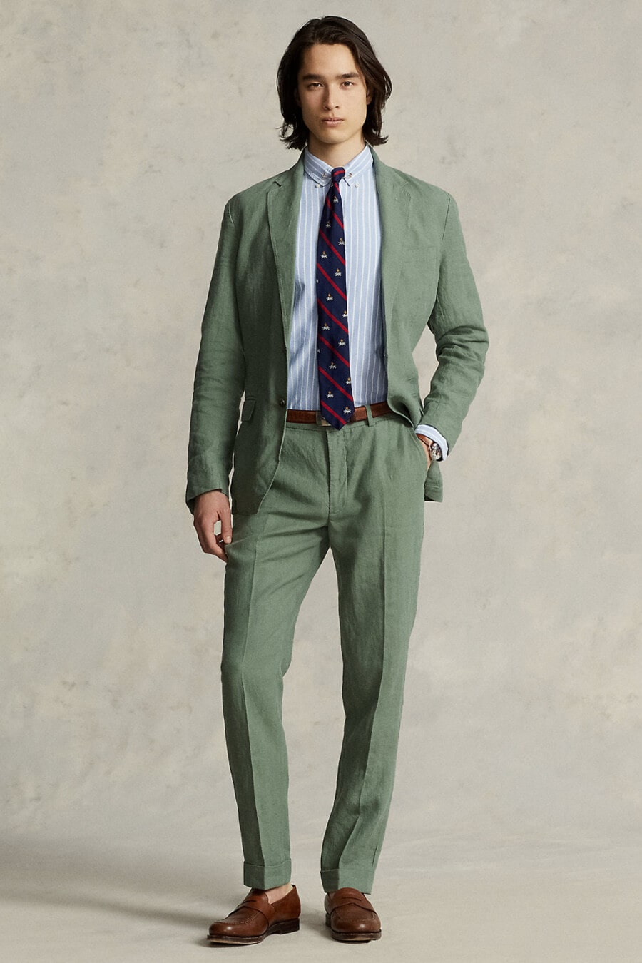 Men's green suit, blue/white stripe shirt, navy/red club repp tie and brown leather penny loafers outfit