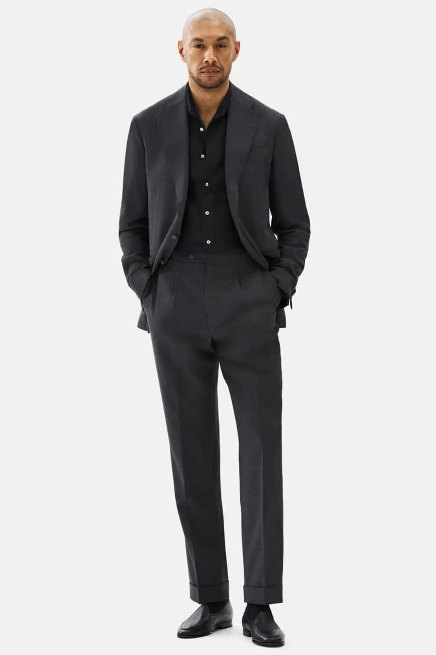 Men's black suit, black shirt and black Belgian loafers outfit