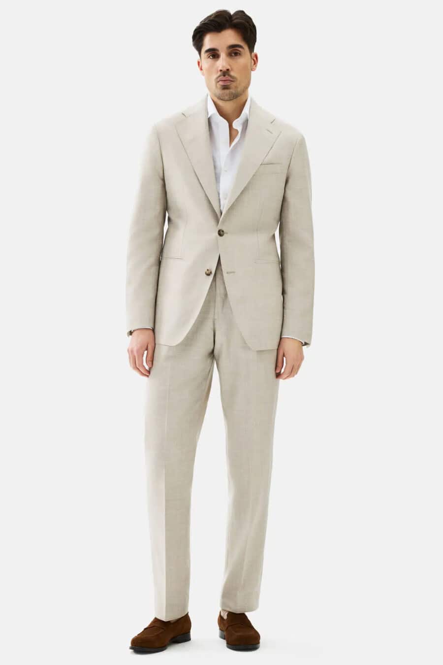 Men's off-white suit, white shirt and brown suede penny loafers outfit