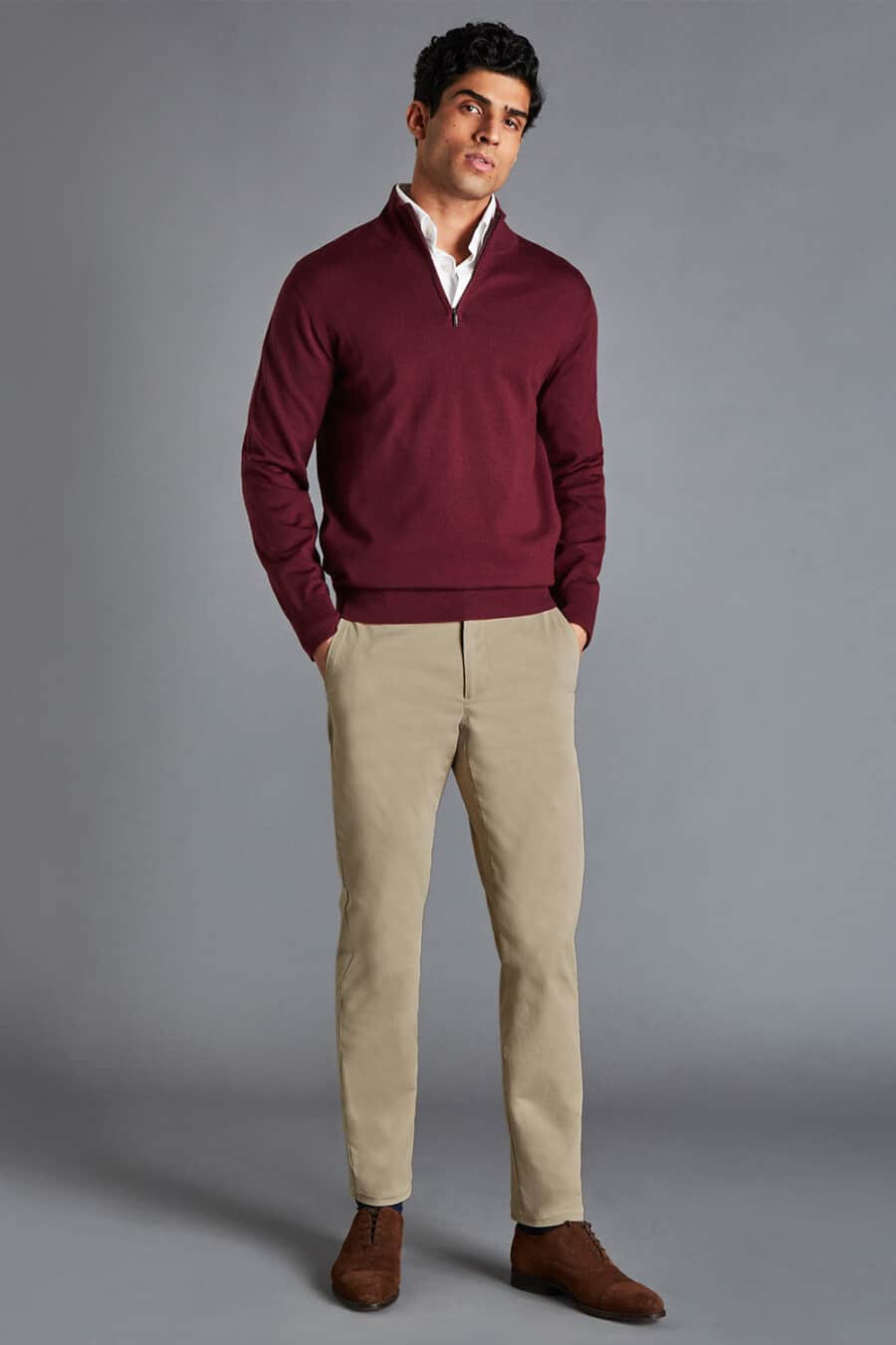 Men's khaki chinos, white shirt, burgundy half zip sweater and brown suede shoes outfit