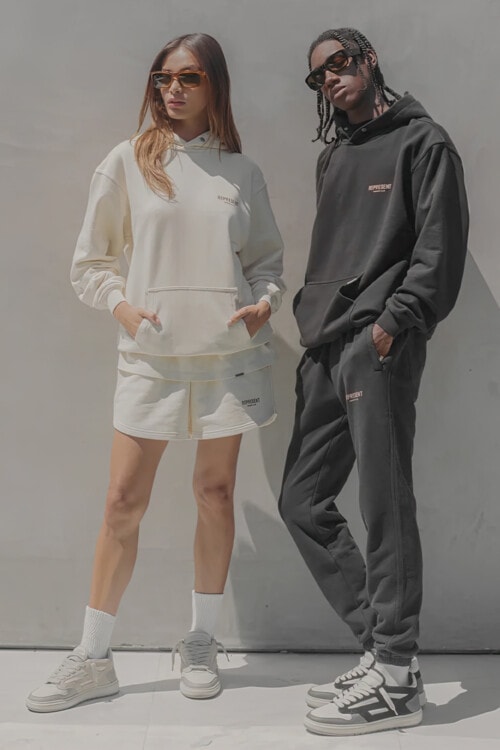 Man and woman wearing Represent streetwear
