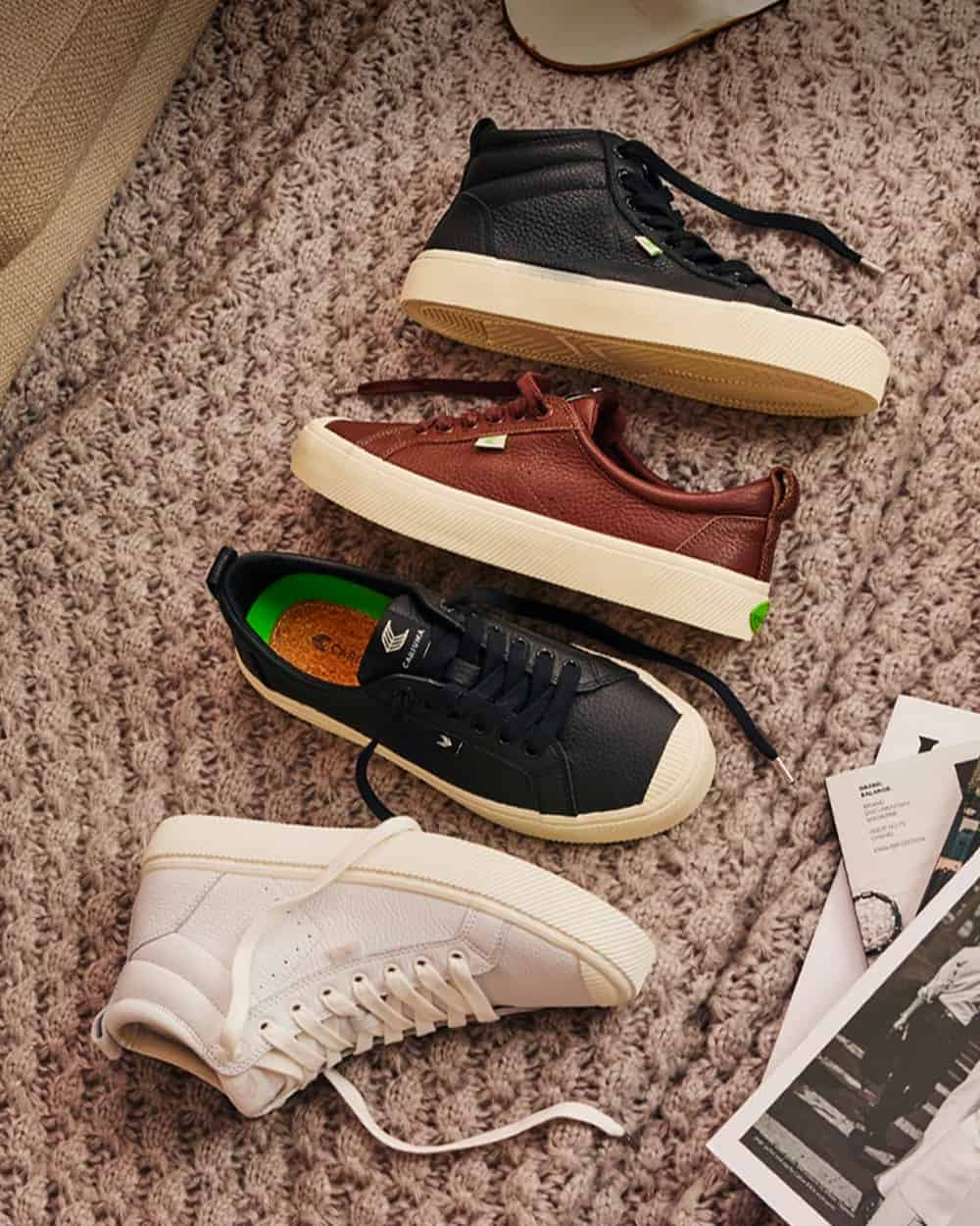 Selection of Cariuma sustainable skate shoes in high-top and low-top and multiple colorways including white, black and brown
