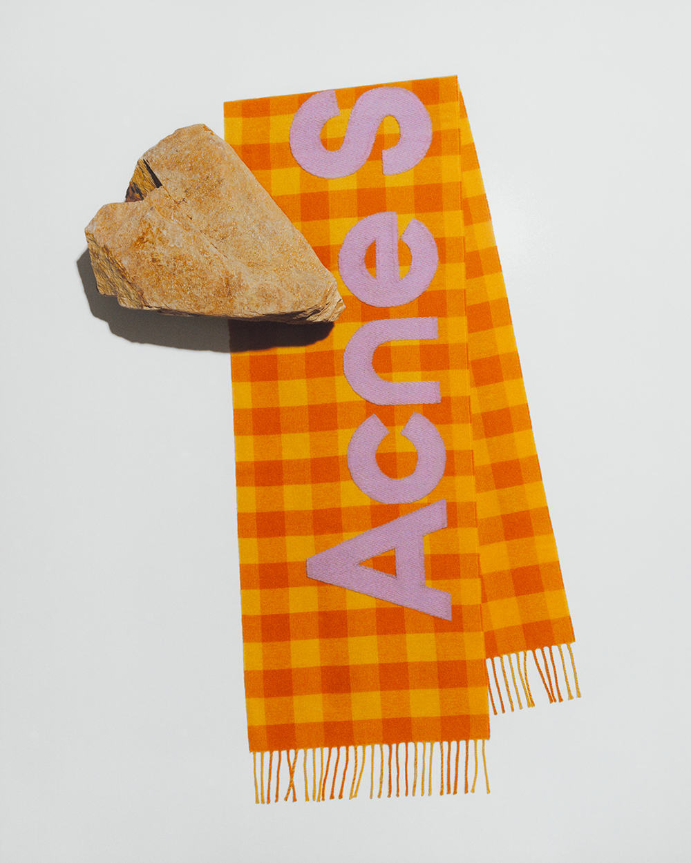 Yellow and orange checked Acne Studios scarf with large logo branding