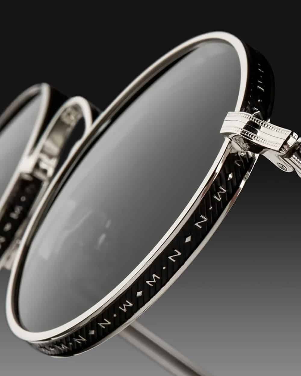Close up of Matsuda metal frame and black lens sunglasses for men