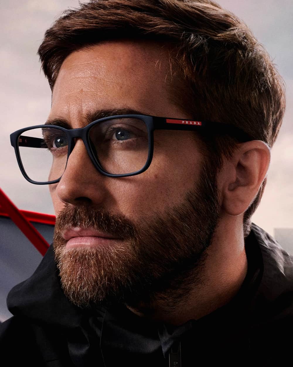 Jake Gyllenhaal wearing black Prada branded spectacles