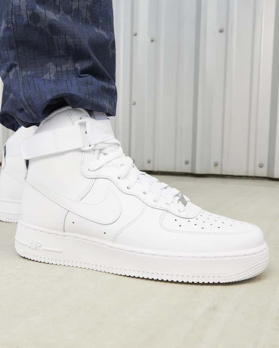 Men's white Nike Air Force 1 High worn on feet
