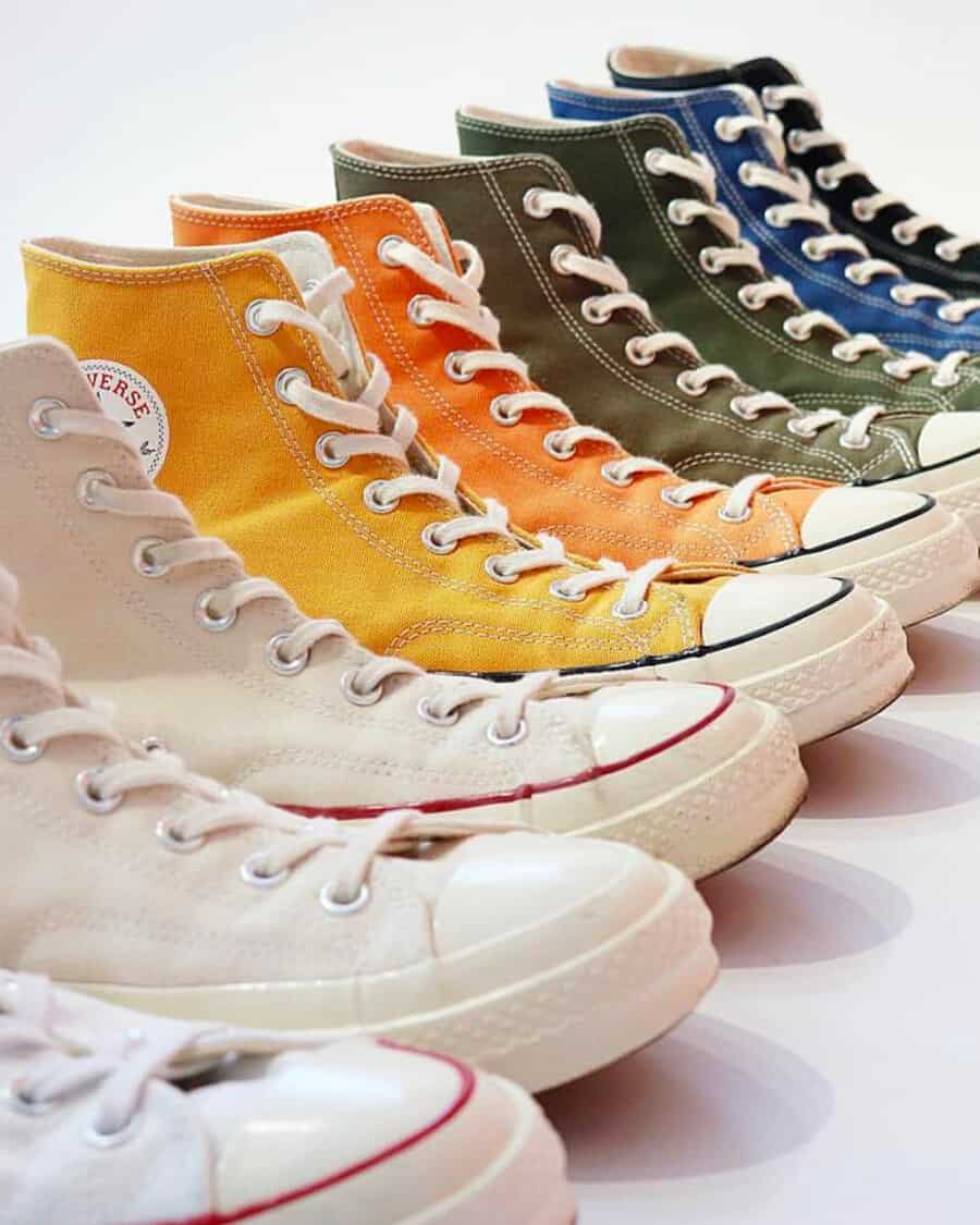 Converse canvas Chuck Taylor Hi sneakers in multiple colorways including cream, white, orange, yellow, green and blue
