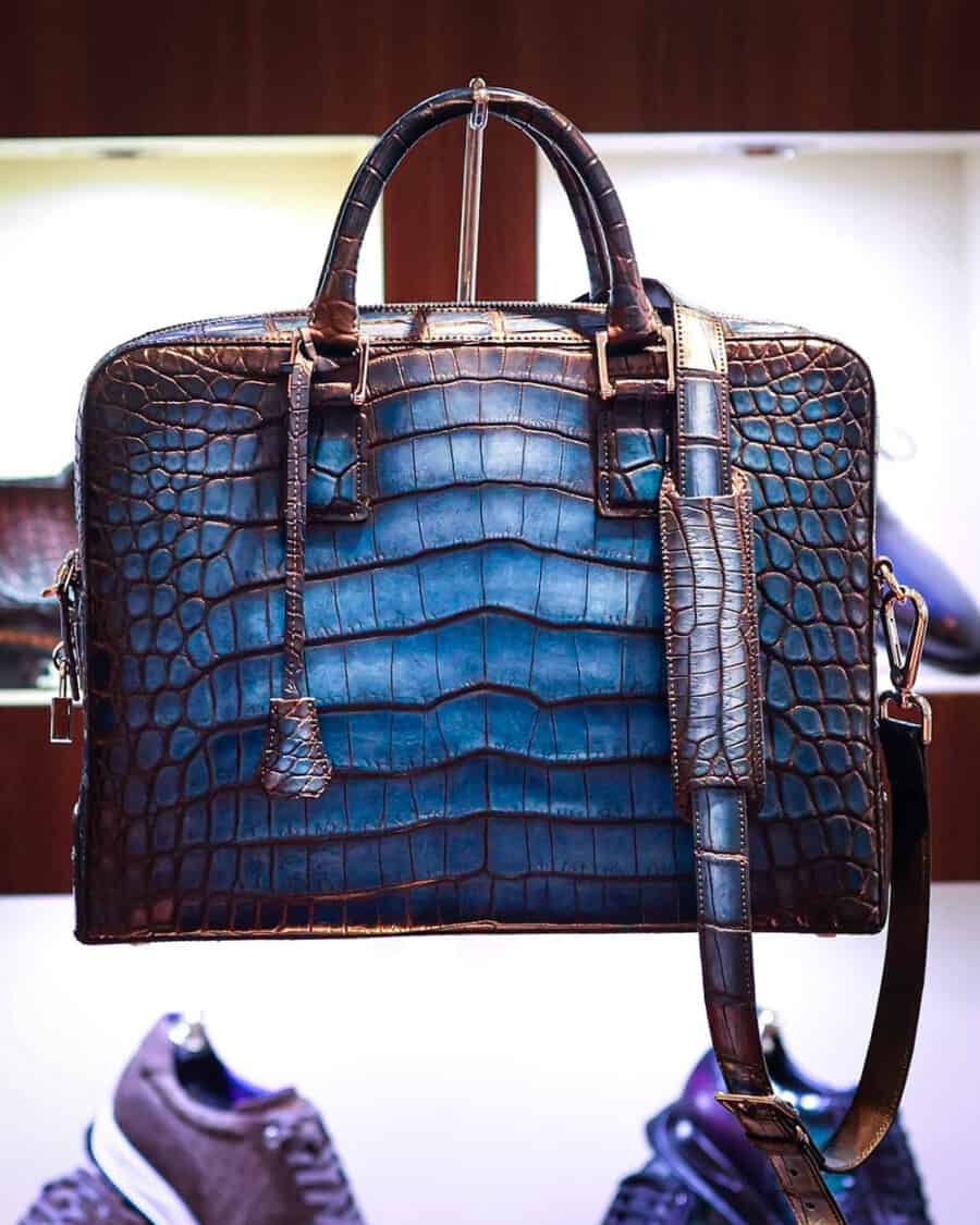 A luxury men's blue crocodile skin leather briefcase by Altan Bottier Paris