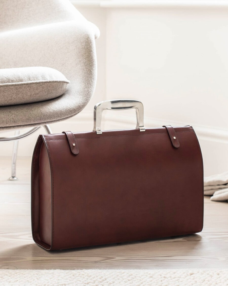 A luxury brown leather Bill Amberg briefcase with silver metal handle